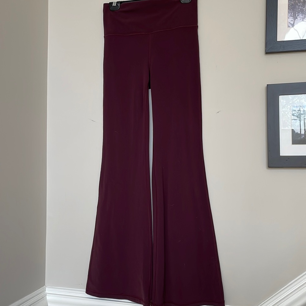 Athleta Elation flare leg pant in beautiful eggplant/purple, like new